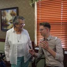 L'Ambizioso Duo-Lilydale Senior Living-tenant visiting with perfromer